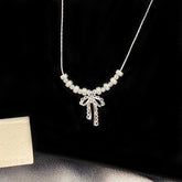 Gold Plated Copper Beaded Bow Necklace