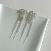 Celeste Crystal Bow Tassel Earrings