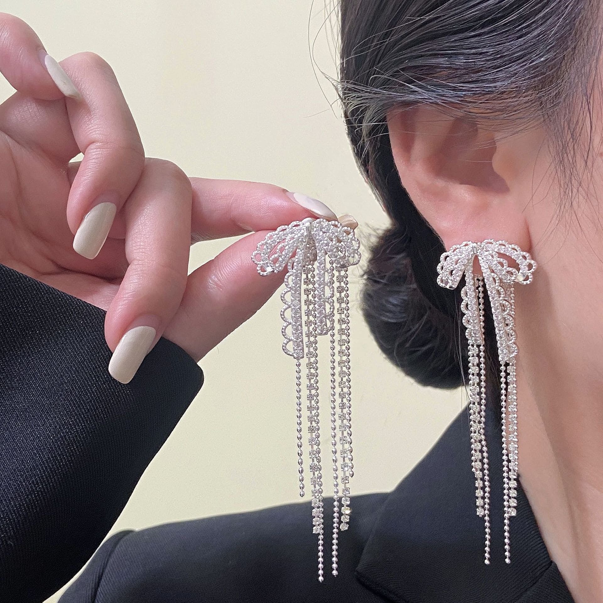 Celeste Crystal Bow Tassel Earrings