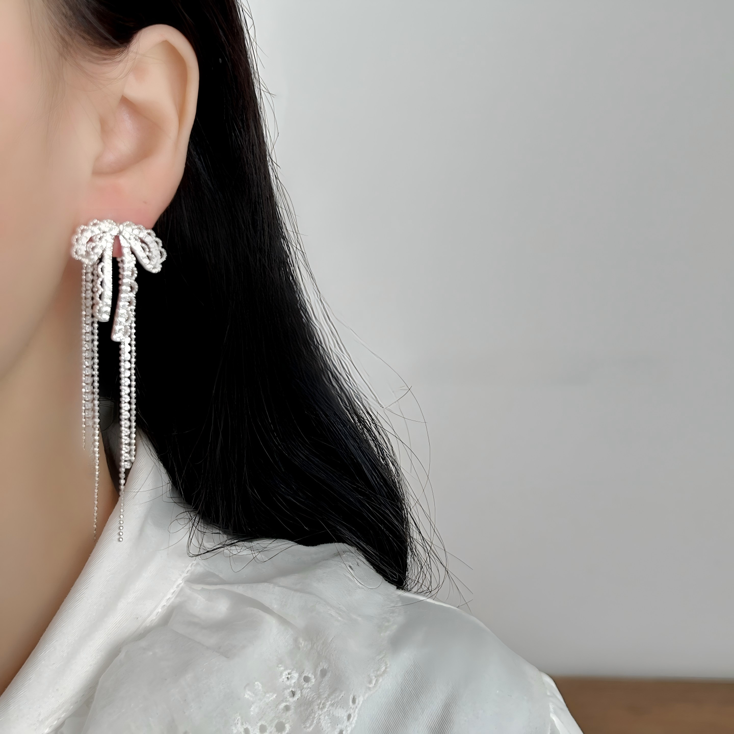 Celeste Crystal Bow Tassel Earrings